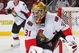 NEWARK, NJ - DECEMBER 19: Goaltender Alex Auld #31 of the Ottawa Senators plays the puck against the New Jersey Devils on December 19, 2008 at the Prudential Center in Newark, New Jersey. (Photo by Bruce Bennett/Getty Images)