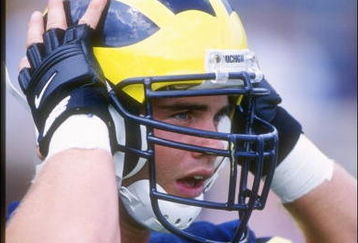 31 Aug 1996: Linebacker Rob Swett of the Michigan Wolverines holds his helmet during a game against the Illinois Fighting Illini at Michigan Stadium in Ann Arbor, Michigan. Michigan won the game 20-8.