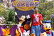 ANAHEIM, CA - JUNE 18:  In this handout provided by Disney, Lakers star and NBA Finals MVP Kobe Bryant waves to thousands of fans during a parade celebrating the 2009 World Champion Los Angeles Lakers at Disneyland on June 18, 2009 in Anaheim, California.  (Photo by Scott Brinegar/Disney via Getty Images)