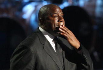 LOS ANGELES, CA - JULY 07:  Former NBA star Magic Johnson pauses as he speaks during the Michael Jackson public memorial service held at Staples Center on July 7, 2009 in Los Angeles, California. Jackson, the iconic pop star, died at the age of 50 at UCLA Medical Center after going into cardiac arrest at his rented home on June 25 in Los Angeles. (Photo by Mario Anzuoni-Pool/Getty Images)