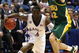 MINNEAPOLIS - MARCH 20:  Sherron Collins #4 of the Kansas Jayhawks drives the ball in the second half against Josh Vaughn #32 of the North Dakota State Bison during the first round of the NCAA Division I Men's Basketball Tournament at the Hubert H. Humphrey Metrodome on March 20, 2009 in Minneapolis, Minnesota.  (Photo by Jonathan Daniel/Getty Images)