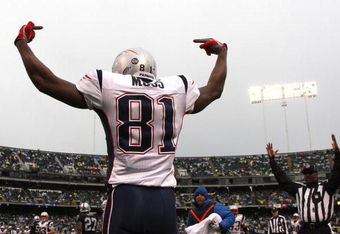 OAKLAND, CA - DECEMBER 14:  Randy Moss #81 of the New England Patriots celeberates after scoring a touchdwon against the Oakland Raiders during an NFL game on December 14, 2008 at the Oakland-Alameda County Coliseum in Oakland, California.  (Photo by Jed Jacobsohn/Getty Images)