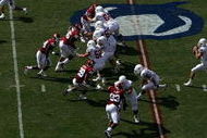 DALLAS - OCTOBER 11: Quarterback Colt McCoy #12 of the Texas Longhorns drops back to pass against the Oklahoma Sooners during the Red River Rivalry at the Cotton Bowl on October 11, 2008 in Dallas, Texas. (Photo by Ronald Martinez/Getty Images)