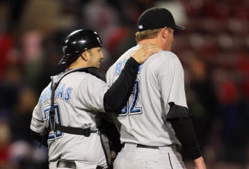 BOSTON - MAY 1:  Rod Barajas #20 of the Toronto Blue Jays congratulates B.J. Ryan #52 following the game against the Boston Red Sox on May 1, 2008 at Fenway Park in Boston, Massachusetts. (Photo by Elsa/Getty Images)