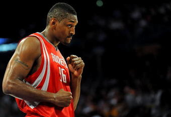 LOS ANGELES, CA - MAY 06:  Ron Artest #96 of the Houston Rockets looks over at a fan in the second quarter against the Los Angeles Lakers in Game Two of the Western Conference Semifinals during the 2009 NBA Playoffs at Staples Center on May 6, 2009 in Los Angeles, California. NOTE TO USER: User expressly acknowledges and agrees that, by downloading and or using this photograph, User is consenting to the terms and conditions of the Getty Images License Agreement.  (Photo by Harry How/Getty Images)