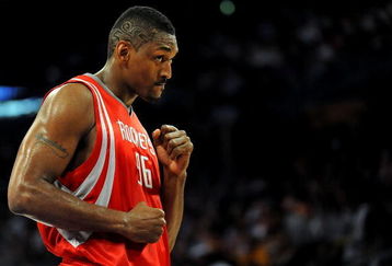 LOS ANGELES, CA - MAY 06:  Ron Artest #96 of the Houston Rockets looks over at a fan in the second quarter against the Los Angeles Lakers in Game Two of the Western Conference Semifinals during the 2009 NBA Playoffs at Staples Center on May 6, 2009 in Los Angeles, California. NOTE TO USER: User expressly acknowledges and agrees that, by downloading and or using this photograph, User is consenting to the terms and conditions of the Getty Images License Agreement.  (Photo by Harry How/Getty Images)
