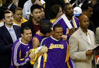 ORLANDO, FL - JUNE 14:  The Los Angeles Lakers bench celebrate in the final moments of their win over the Orlando Magic in Game Five of the 2009 NBA Finals on June 14, 2009 at Amway Arena in Orlando, Florida.  The Lakers won 99-86.  NOTE TO USER:  User expressly acknowledges and agrees that, by downloading and or using this photograph, User is consenting to the terms and conditions of the Getty Images License Agreement.  (Photo by Chris Graythen/Getty Images)