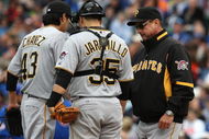 CHICAGO - MAY 27: Manager John Russell #7 of the Pittsburgh Pirates (R) takes pitcher Jesse Chavez #43 out of a game against the Chicago Cubs as catcher Jason Jaramillo #35 watches on May 27, 2009 at Wrigley Field in Chicago, Illinois. The Cubs defeated the Pirates 5-2. (Photo by Jonathan Daniel/Getty Images) 