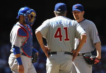 PHOENIX - APRIL 29:  Manager Lou Piniella talks with starting pitcher Ryan Dempster #46 of the Chicago Cubs during the game against the Arizona Diamondbacks at Chase Field on April 29, 2009 in Phoenix, Arizona. The Diamondbacks defeated the Cubs 10-0.  (Photo by Christian Petersen/Getty Images)