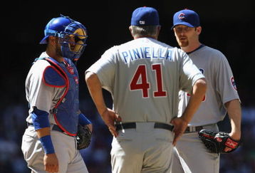 PHOENIX - APRIL 29:  Manager Lou Piniella talks with starting pitcher Ryan Dempster #46 of the Chicago Cubs during the game against the Arizona Diamondbacks at Chase Field on April 29, 2009 in Phoenix, Arizona. The Diamondbacks defeated the Cubs 10-0.  (Photo by Christian Petersen/Getty Images)