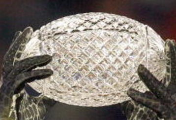 MIAMI - JANUARY 08:  Brandon Spikes #51 of the Florida Gators holds up the winning trophy after the FedEx BCS National Championship Game against the Oklahoma Sooners at Dolphin Stadium on January 8, 2009 in Miami, Florida.  (Photo by Eliot J. Schechter/Getty Images)