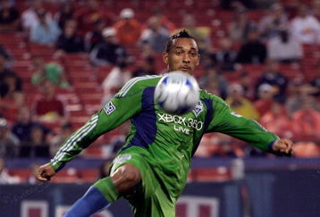 EAST RUTHERFORD, NJ - JUNE 20:  Tyrone Marshall #14 of the Seattle Sounders FC plays the ball against the New York Red Bulls at Giants Stadium in the Meadowlands on June 20, 2009 in East Rutherford, New Jersey.  (Photo by Mike Stobe/Getty Images for New York Red Bull)
