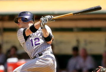 OAKLAND, CA - JUNE 28:  Clint Barmes #12 of the Colorado Rockies bats against the Oakland Athletics at the Oakland Coliseum on June 28, 2009 in Oakland, California.  (Photo by Ezra Shaw/Getty Images)