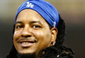SAN DIEGO - JULY 3:  Manny Ramirez #99 of the Los Angeles Dodgers smiles against the San Diego Padres during the game on July 3, 2009 at Petco Park in San Diego, California. (Photo by Jeff Gross/Getty Images)