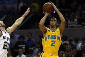 SAN ANTONIO - MAY 15:  Guard Jannero Pargo #2 of the New Orleans Hornets takes a shot against Manu Ginobili #20 of the San Antonio Spurs in Game Six of the Western Conference Semifinals during the 2008 NBA Playoffs at the AT&T Center on May 15, 2008 in San Antonio, Texas. NOTE TO USER: User expressly acknowledges and agrees that, by downloading and or using this photograph, User is consenting to the terms and conditions of the Getty Images License Agreement.  (Photo by Ronald Martinez/Getty Images)