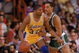 LOS ANGELES - 1987: Magic Johnson #32 of the Los Angeles Lakers posts up Dennis Johnson #3 of the Boston Celtics during an NBA game at the Great Western Forum in Los Angeles, California in 1987. (Photo by: Rick Stewart/Getty Images)