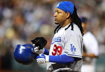 NEW YORK - JULY 08:  Manny Ramirez #99 of the Los Angeles Dodgers looks on after grounding out to end the sixth inning against the New York Mets on July 8, 2009 at Citi Field in the Flushing neighborhood of the Queens borough of New York City.  (Photo by Jim McIsaac/Getty Images)