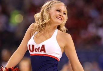 INDIANAPOLIS - MARCH 27:  A cheerleader from the Arizona Wildcats performs against the Louisville Cardinals  during the third round of the NCAA Division I Men's Basketball Tournament at the Lucas Oil Stadium on March 27, 2009 in Indianapolis, Indiana. Louisville won 103-64. (Photo by Andy Lyons/Getty Images)