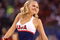 INDIANAPOLIS - MARCH 27:  A cheerleader from the Arizona Wildcats performs against the Louisville Cardinals  during the third round of the NCAA Division I Men's Basketball Tournament at the Lucas Oil Stadium on March 27, 2009 in Indianapolis, Indiana. Louisville won 103-64. (Photo by Andy Lyons/Getty Images)