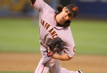 OAKLAND, CA - JUNE 23:  Tim Lincecum #55 of the San Francisco Giants pitches against the Oakland Athletics during a Major League Baseball game on June 23, 2009 at the Oakland Coliseum in Oakland, California.  (Photo by Jed Jacobsohn/Getty Images)