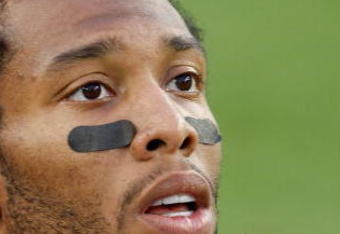 TAMPA, FL - FEBRUARY 01:  Wide receiver Larry Fitzgerald #11 of the Arizona Cardinals looks on as he warms up against the Pittsburgh Steelers during Super Bowl XLIII on February 1, 2009 at Raymond James Stadium in Tampa, Florida.  (Photo by Jamie Squire/Getty Images)