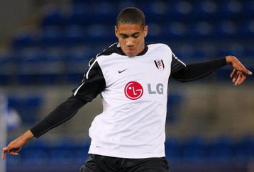 GOLD COAST, AUSTRALIA - JULY 08:  Chris Smalling of Fulham kicks the ball during the exhibition football match between Gold Coast United and Fulham FC at Skilled Stadium on July 8, 2009 in Gold Coast, Australia.  (Photo by Bradley Kanaris/Getty Images)