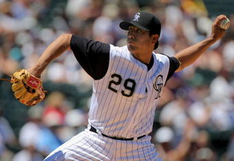 DENVER - JULY 08:  Starting pitcher Jorge De La Rosa #29 ofthe Colorado Rockies delivers against the Washington Nationals during MLB action at Coors Field on July 8, 2009 in Denver, Colorado.  (Photo by Doug Pensinger/Getty Images)