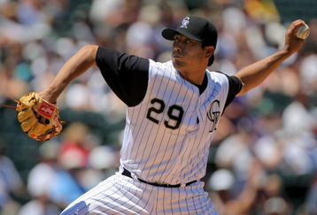 DENVER - JULY 08:  Starting pitcher Jorge De La Rosa #29 ofthe Colorado Rockies delivers against the Washington Nationals during MLB action at Coors Field on July 8, 2009 in Denver, Colorado.  (Photo by Doug Pensinger/Getty Images)