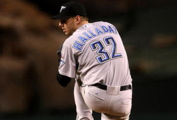 ANAHEIM, CA - MAY 6:  Roy Halladay #32 of the Toronto Blue Jays throws a pitch against the Los Angeles Angels of Anaheim at Angel Stadium May 6, 2009 in Anaheim, California.  (Photo by Stephen Dunn/Getty Images)