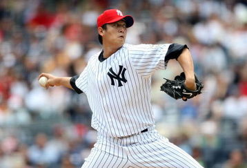NEW YORK - JULY 04:  Chien-Ming Wang #40 of the New York Yankees pitches against the Toronto Blue Jays on July 4, 2009 at Yankee Stadium in the Bronx borough of New York City.  (Photo by Nick Laham/Getty Images)