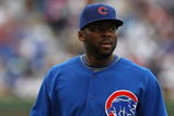 CHICAGO - MAY 27: Milton Bradlery #21 of the Chicago Cubs warms-up before a game against the Pittsburgh Pirates on May 27, 2009 at Wrigley Field in Chicago, Illinois. The Cubs defeated the Pirates 5-2.  (Photo by Jonathan Daniel/Getty Images)