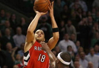BOSTON - NOVEMBER 10:  Anthony Parker #18  of the Toronto Raptors takes a shot as Paul Pierce #34 of the Boston Celtics defends on November 10,  2008 at TD Banknorth Garden in Boston, Massachusetts. The Celtics defeated the Toronto Raptors 94-87.  (Photo by Elsa/Getty Images)