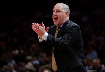NEW YORK - MARCH 12:  Head Coach Buzz Williams of the Marquette Golden Eagles reacts on the sidelines during a game against the Villanova Wildcats during the second round of the Big East Tournament at Madison Square Garden on March 12, 2009 in New York City.  (Photo by Chris McGrath/Getty Images)