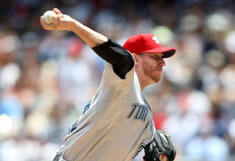 NEW YORK - JULY 04:  Roy Halladay #32 of the Toronto Blue Jays pitches against the New York Yankees on July 4, 2009 at Yankee Stadium in the Bronx borough of New York City.  (Photo by Nick Laham/Getty Images)