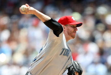 NEW YORK - JULY 04:  Roy Halladay #32 of the Toronto Blue Jays pitches against the New York Yankees on July 4, 2009 at Yankee Stadium in the Bronx borough of New York City.  (Photo by Nick Laham/Getty Images)