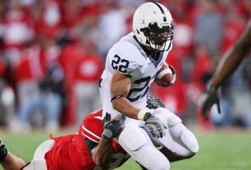 COLUMBUS, OH - OCTOBER 25: Running back Evan Royster #22 of the Penn State Nittany Lions is dragged down by Cameron Heyward #97 of the Ohio State Buckeyes on October 25, 2008 at Ohio Stadium in Columbus, Ohio.  (Photo by Jamie Sabau/Getty Images)