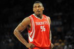 LOS ANGELES, CA - MAY 06:  Ron Artest #96 of the Houston Rockets looks on against the Los Angeles Lakers in Game Two of the Western Conference Semifinals during the 2009 NBA Playoffs at Staples Center on May 6, 2009 in Los Angeles, California. NOTE TO USER: User expressly acknowledges and agrees that, by downloading and or using this photograph, User is consenting to the terms and conditions of the Getty Images License Agreement.  (Photo by Harry How/Getty Images)