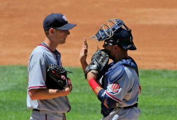 DENVER - JULY 08:  Starting pitcher Ross Detwiler #48 of the Washington Nationals is visited on the mound by catcher Wil Nieves #23 during MLB action against the Colorado Rockies at Coors Field on July 8, 2009 in Denver, Colorado. Detwiler got the loss as the Rockies defeated the Nationals 10-4.  (Photo by Doug Pensinger/Getty Images)