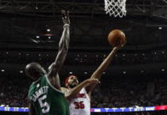 AUBURN HILLS, MI - MAY 30:  Rasheed Wallace #36 of the Detroit Pistons shoots a layup against Kevin Garnett #5 of the Boston Celtics in Game Six of the Eastern Conference Finals during the 2008 NBA Playoffs at the Palace of Auburn Hills on May 30, 2008 in Auburn Hills, Michigan.  The Celtics won 89-81.  NOTE TO USER: User expressly acknowledges and agrees that, by downloading and/or using this photograph, user is consenting to the terms and conditions of the Getty Images License Agreement. (Photo by Gregory Shamus/Getty Images)