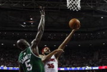 AUBURN HILLS, MI - MAY 30:  Rasheed Wallace #36 of the Detroit Pistons shoots a layup against Kevin Garnett #5 of the Boston Celtics in Game Six of the Eastern Conference Finals during the 2008 NBA Playoffs at the Palace of Auburn Hills on May 30, 2008 in Auburn Hills, Michigan.  The Celtics won 89-81.  NOTE TO USER: User expressly acknowledges and agrees that, by downloading and/or using this photograph, user is consenting to the terms and conditions of the Getty Images License Agreement. (Photo by Gregory Shamus/Getty Images)