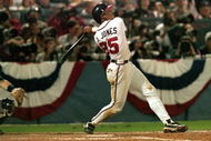 ATLANTA - OCTOBER 22:  Andruw Jones #25 of the Atlanta Braves bats during Game three of the 1996 World Series against the New York Yankees at Atlanta-Fulton County Stadium on October 22, 1996 in Atlanta, Georgia. The Yankees defeated the Braves 5-2. (Photo by Stephen Dunn/Getty Images)