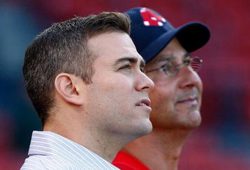 BOSTON - APRIL 24: General Manager Theo Epstein and Manger Terry Francona of the Boston Red Sox watch the pre-game action before a game with the New York Yankees at Fenway Park, April 24, 2009, in Boston, Massachusetts. (Photo by Jim Rogash/Getty Images)