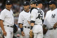 NEW YORK - JULY 2: (L-R) Alex Rodriguez #13, Derek Jeter #2, Francisco Cervelli #29, pitching coach Dave Eiland #58, CC Sabathia #55 and Robinson Cano #24 of the New York Yankees meet on the mound during action against the Seattle Mariners at Yankee Stadium on July 2, 2009 in the Bronx borough of New York City. (Photo by Nick Laham/Getty Images)