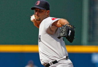 ATLANTA - JUNE 27:  Starting pitcher Tim Wakefield #49 of the Boston Red Sox pitches against the Atlanta Braves at Turner Field on June 27, 2009 in Atlanta, Georgia.  (Photo by Kevin C. Cox/Getty Images)