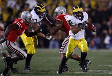 COLUMBUS, OH - NOVEMBER 18:  Mike Hart #20 of the Michigan Wolverines runs the ball against the Ohio State Buckeyes November 18, 2006 at Ohio Stadium in Columbus, Ohio. Ohio State won 42-39. (Photo by Gregory Shamus/Getty Images)
