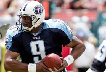 MIAMI - SEPTEMBER 11:  Steve McNair #9 and Quarterback for the Tennessee Titans prepares to hand off the ball in the first half of the game against the Miami Dolphins won by the Titans 17-7at Pro Player Stadium on September 11, 2004 in Miami, Florida. (Photo by Robert Laberge/Getty Images)