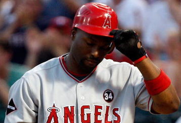 ARLINGTON, TX - JULY 1:  Torii Hunter #48 of the Los Angeles Angels of Anaheim walks off after striking out against the Texas Rangers at Rangers Ballpark July 1, 2009 in Arlington, Texas.  (Photo by Ronald Martinez/Getty Images)