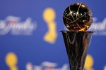 ORLANDO, FL - JUNE 14:  The Bill Russell MVP trophy is shown as Kobe Bryant #24 of the Los Angeles Lakers speaks to the media after the Lakers defeated the Orlando Magic in Game Five of the 2009 NBA Finals on June 14, 2009 at Amway Arena in Orlando, Florida.  The Lakers won 99-86.  NOTE TO USER:  User expressly acknowledges and agrees that, by downloading and or using this photograph, User is consenting to the terms and conditions of the Getty Images License Agreement.  (Photo by Chris Graythen/Getty Images)