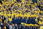 ANN ARBOR, MI - OCTOBER 25:  Fans of the Michigan Wolverines cheer from the stands during the game against the Michigan State Spartans on October 25, 2008 at Michigan Stadium in Ann Arbor, Michigan. Michigan State won the game 35-21. (Photo by Gregory Shamus/Getty Images)