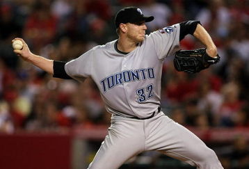 ANAHEIM, CA - MAY 6:  Roy Halladay #32 of the Toronto Blue Jays throws a pitch against the Los Angeles Angels of Anaheim at Angel Stadium May 6, 2009 in Anaheim, California.  (Photo by Stephen Dunn/Getty Images)